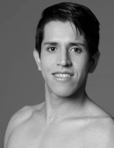 Black and white headshot Erick